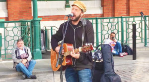 Street Performer Plays ‘While My Guitar Gently Weeps,’ & People Are Stunned Over His Beautiful Voice!