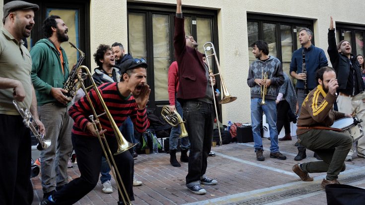 Street musicians seen performing on Ermou Street, Athens on | I Love Classic Rock Videos