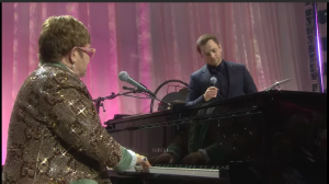 Elton John performed “Tiny Dancer” with Taron Egerton at Oscars Party