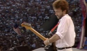 Live Aid 1985: Eric Clapton Performs “Layla” In Front Of 100,000 People
