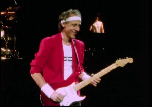 Watch Mark Knopfler’s Epic Guitar Solo in ‘Sultans Of Swing’ — Alchemy Live 1984
