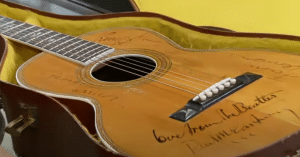 Woman Tries Selling Autographed Beatles Guitar To Only Find Out The Truth