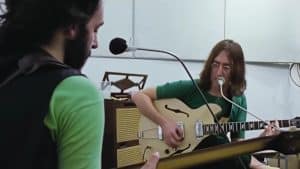 John and Paul recording rehearsing a song