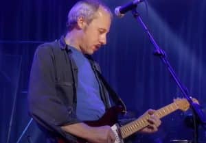 Mark Knopfler’s New Song Challenges Gigantic Pop Icon In Charts