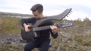 Watch Incredible Cover of Tom Petty’s “Free Fallin’” With A Harp Guitar