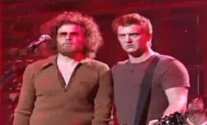 Watch Queens of the Stone Age Performance Crashed By “More Cowbell” Gene Frenkle