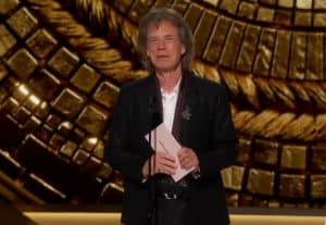 Mick Jagger Makes Delightful Surprise Appearance At Oscars Replacing Bob Dylan