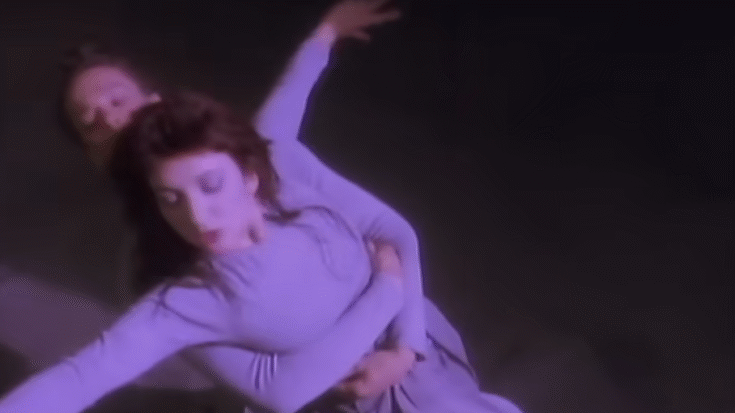 Kate Bush performing an interpretive dance in the music video for