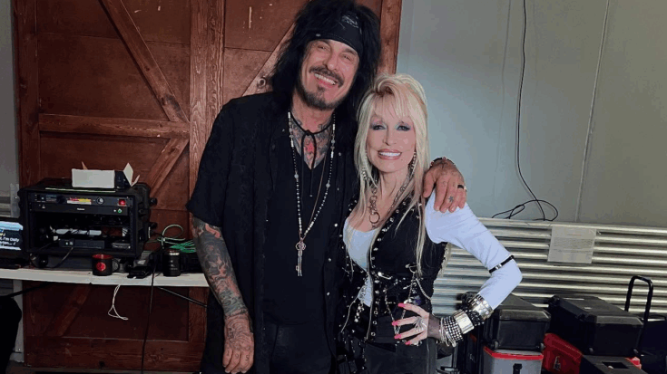Nikki Sixx and Dolly Parton smiling together backstage during their collaboration on the reimagined version of “Home Sweet Home.”