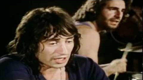 Hotlegs performing live in the early 1970s, featuring the bandโs singer and drummer.