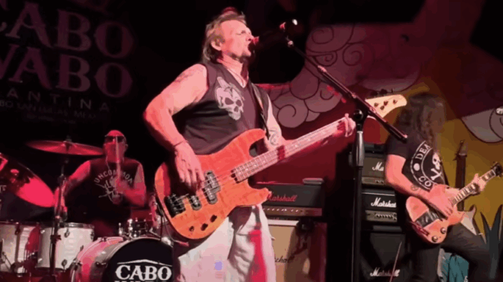 Michael Anthony performing live on stage at Cabo Wabo Cantina during Sammy Hagar’s Birthday Bash, playing bass with the band in front of an energetic crowd.