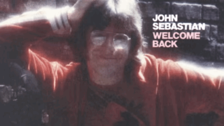 Cover art for John Sebastian’s 1976 single “Welcome Back,” featuring the musician leaning against a wall in a red shirt with the song title and his name displayed beside him.